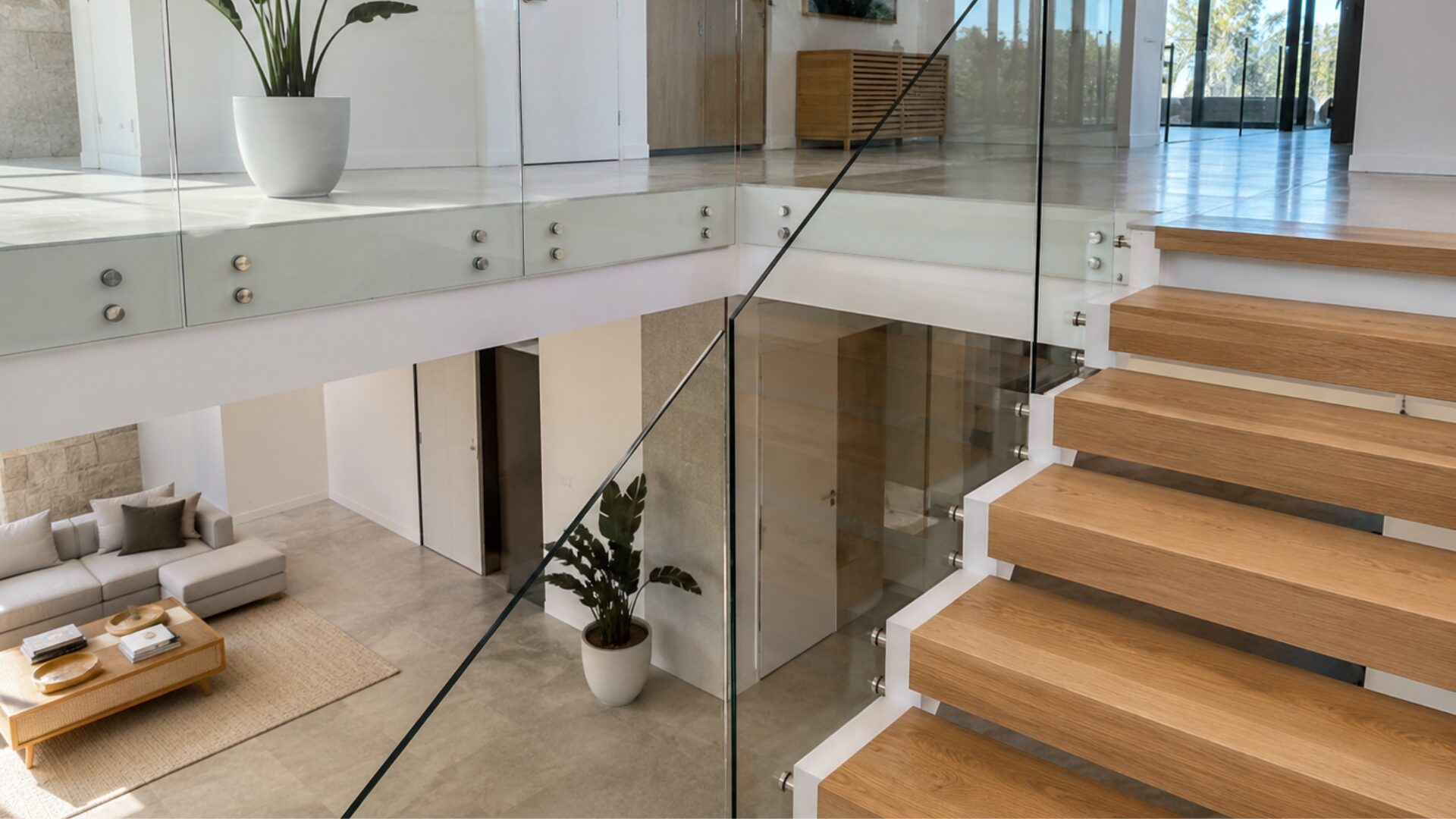 Professional glass and aluminum installation team working on a modern property